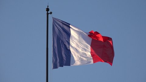 PARIS, FRANCE, JUNE 30, 2019 France Flag in Paris, French Banner Waving on Blue Sky at Sunset, National Patriotic Symbol, Patriotism Sign View in Europe