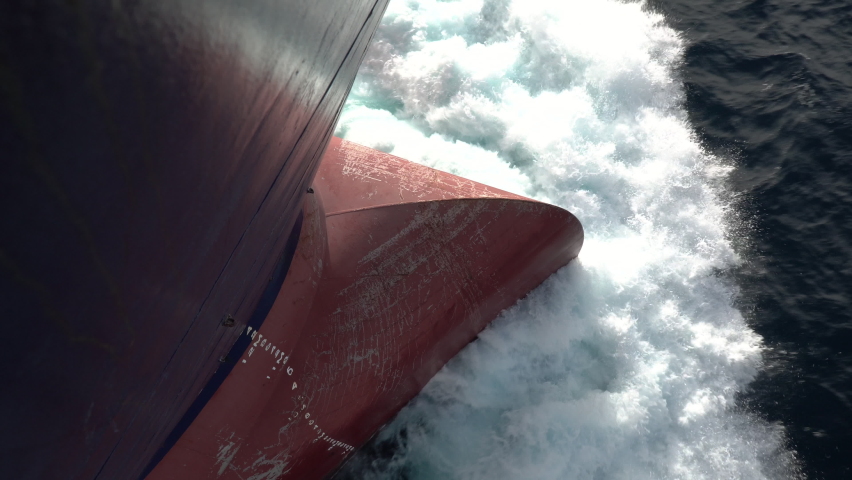 Forward part of a cargo ship underway in high seas. Royalty-Free Stock Footage #1058489587