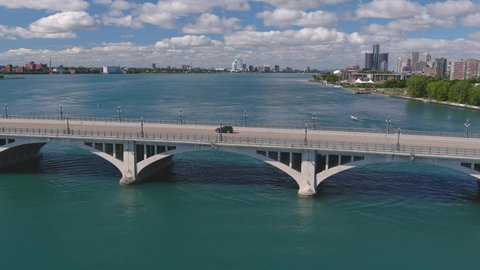 Establishing shot of the Douglas MacArthur Bridge over the Detroit river. This video was filmed in 4k for best image quality.