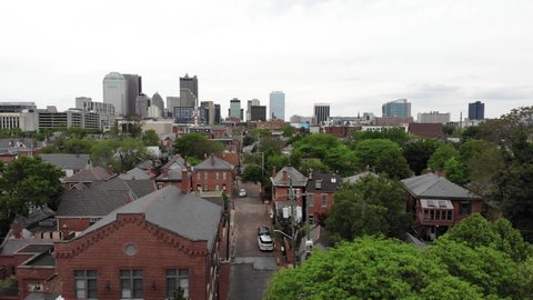 Flying Above Historic Neighborhood of Columbus, Ohio, USA. Overview on Downtown Under Cloudy Sky, Drone Shot