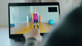Close-up of laptop screen with athletic trainer waving and smiling. Portrait of confident Caucasian woman training sportspeople online. Concept of remote working on Covid-19 pandemic quarantine. - Powered by Shutterstock - Get 15% off with code: PIKWIZARD15