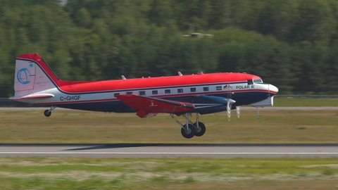 oslo airport norway - ca august 2020: old aircraft douglas dc3 converted to basler bt67 landing touchdown