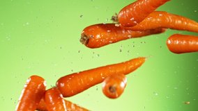 Super Slow Motion Shot of Flying Carrots, Collision in the Air at 1000fps. - Powered by Shutterstock - Get 15% off with code: PIKWIZARD15