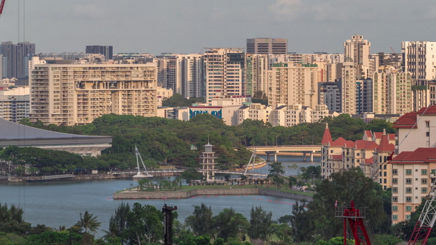 Evening aerial view to Tanjong Rhu look out tower in Singapore timelapse. This was once a busy area with shipyards but have now transformed into a beautiful residential area