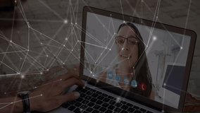 Animation of digital network of connections over woman on laptop screen during video call in the office. Global business online network interface concept digital composite.