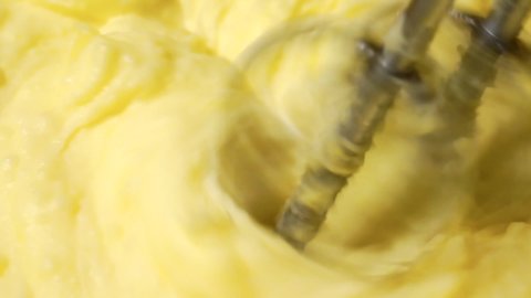 home cooking.an electric mixer whips the mashed potatoes.close-up.