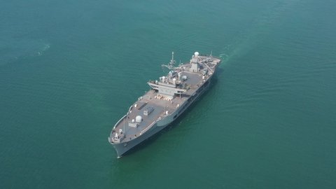 Aerial view of navy aircraft carrier, navy ship,battle ship, warship,Military ship resilient, armed with weapon systems, though armament on troop transports. support navy ship. Military sea transport.