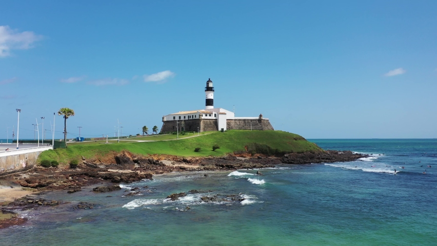 Barra Lighthouse, Salvador, Bahia, Brazil. Panorama Landscape. Salvador, Bahia, Brazil. Tropical Travel Destination. Sunny. Barra Lighthouse. Salvador, Bahia, Brazil. Aerial landscape of Coastal City.