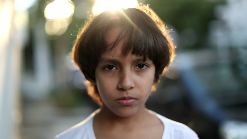 Ethnically diverse child portrait face outdoors sunset time. | Shutterstock HD Video #1058606917