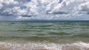slow motion of Tropical beach sea on sunny day with beautiful clouds on sky in the summer.  Nature of the sea, Video Clip