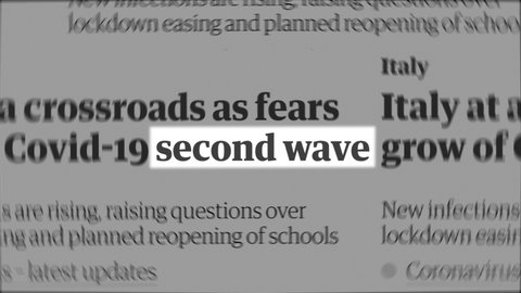 'Second Wave' text highlighted among random words, similar to newspaper articles across the globe. Coronavirus 
(COVID-19) new wave concept.