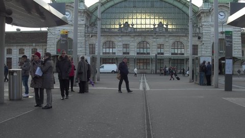 Basel / Switzerland - December 02 2017: People are walking to Basel Main Station (Bahnhof Basel SBB) Switzerland