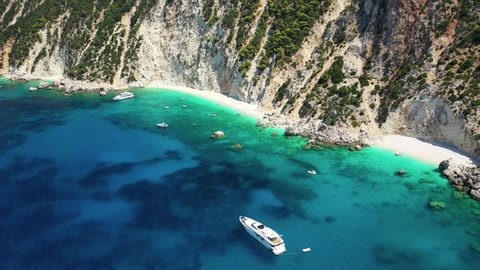 Aerial drone video of beautiful paradise bay of Afales and white beach in beautiful Ionian island of Ithaki or Ithaca, Greece