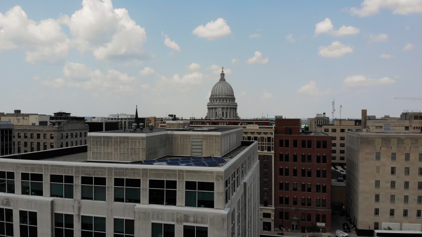 Aerial View on Residental Buildings and Wisconsin State Capitol Building in Madison USA with Solar Panel Arrays