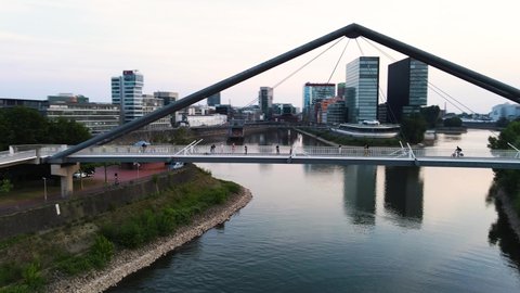 Düsseldorf, Germany - drone shot of the Medienhafen/ cityscape while sunset.