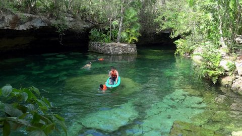 Kantun-Chi Ecopark / Mexico - MARCH 24, 2019:
Tourists in the Uch Ben Ha open cenote (Ancient Water)