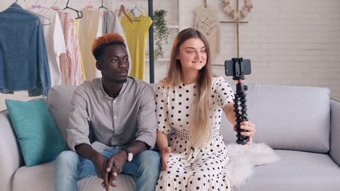A Girl and Boy Takes Pictures of Themselves, Conducts a Blogging. A Bloggers Creating a New Content for Video Blog. Cute Lady and Young Man Shares the News With Her Followers during Vlogging. : vidéo de stock
