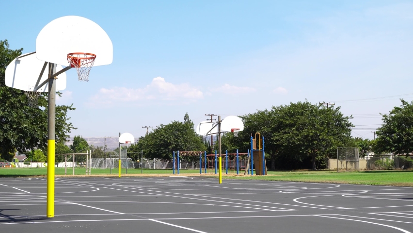 Empty School Playground Basketball Court and Recess Area Royalty-Free Stock Footage #1058670757