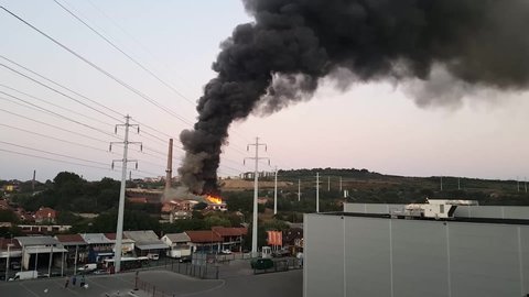 Belgrade, Serbia - September 8, 2020: Fire burning with Dark smoke in Belgrade near old brick factory at Municipally of Palilula, Karaburma