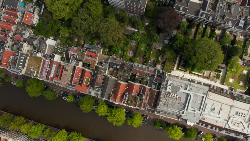 Overhead Birds View of Amsterdam, Netherlands Neighbourhood with Green Trees and Red Rooftops