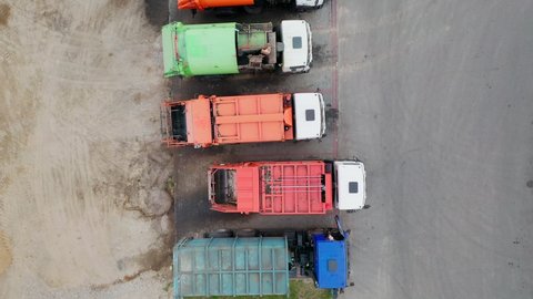 Equipment for cleaning garbage from city streets. View from top to bottom. Old machinery trucks for garbage collection