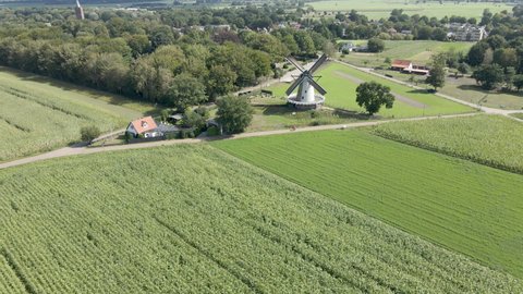 Beautiful aerial of traditonal windmill in rural area