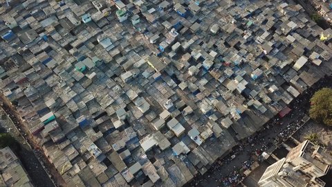 Tilt Up Aerial View on Dharavi Slum, Mumbai. Flying Above Modern Indian Ghetto, Poor Housing Neighborhood