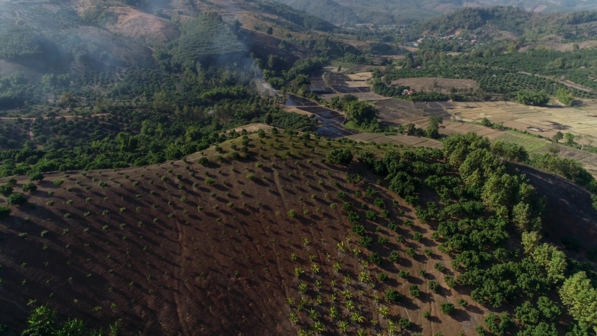 AERIAL Farmland and Shifting Cultivation, Northern Thailand Mountains | Shutterstock HD Video #1058691934