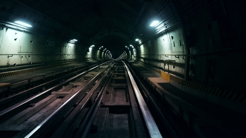Hyperlapse POV Train riding in the subway tunnel. Time lapse of automatic train moving to tunnel Royalty-Free Stock Footage #1058704756