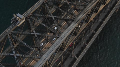 Tracking cars driving on Sydney Harbour Bridge in Australia. Aerial view