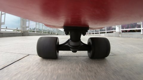 People riding skateboard on foot bridge ,Under skateboard  POV - People skateboarding on road point of view  库存视频