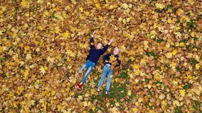Young fit blonde girl in sportswear smiles and shows copy space. empty place for promotional image. studio shot isolated on yellow background. - Powered by Shutterstock - Get 15% off with code: PIKWIZARD15