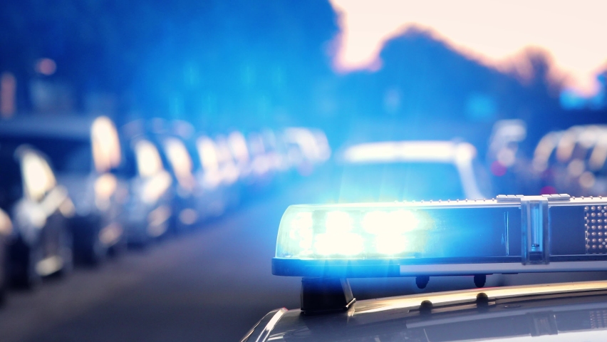 Siren light on roof of police car at night street. Themes crime, emergency and help.  Royalty-Free Stock Footage #1058718748