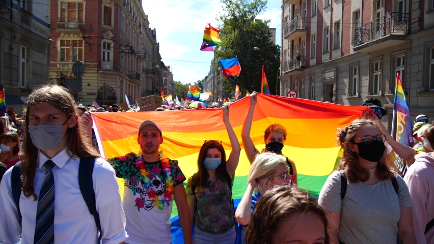 KATOWICE/ Poland - September 7, 2020: LGBT equality march, pride parade. Young people with rainbows are walking the streets to fight for LGBTQ+ rights. Demonstration during coronavirus pandemic.