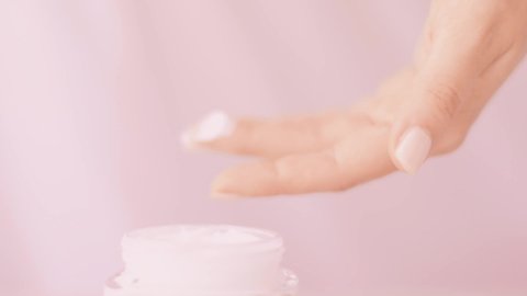 Woman and her morning skincare routine, female hand applying moisturizing cream or body lotion for healthy skin, organic cosmetic product and luxury beauty brand, stock footage