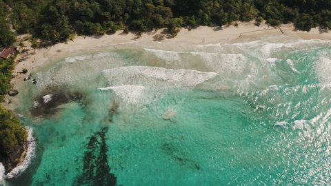 Aerial drone shot of the island coastline sea, white beach and jungle in Bocas del Toro, Panama