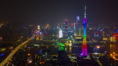 GUANGZHOU, CHINA - OCTOBER 27 2019: night illumination guangzhou city riverside downtown aerial timelapse panorama 4k circa october 27 2019 hangzhou, china. 