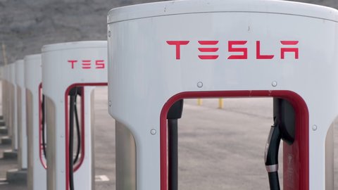 Baker , California / United States - 04 07 2019: Close-Up Tesla Supercharger Station In California