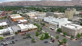 Drone footage of old historical buildings and contemporary businesses and shops downtown Yakima, Washington