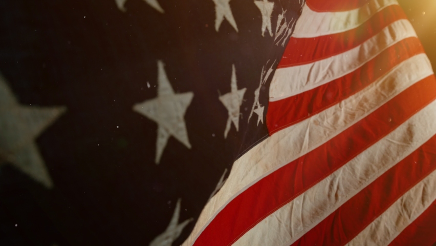 Close up of American Flag Waving. USA Banner Flaping in Wind. Concept of 4th of July, Independence Day, American Election and Other Feasts Royalty-Free Stock Footage #1058760238