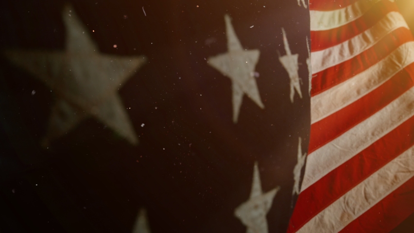 Close up of American Flag Waving. USA Banner Flaping in Wind. Concept of 4th of July, Independence Day, American Election and Other Feasts Royalty-Free Stock Footage #1058760238