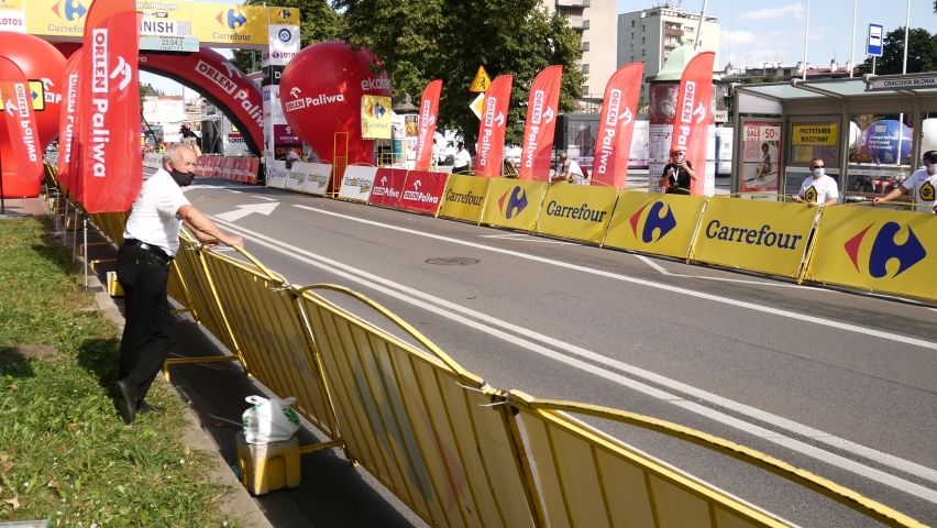 KRAKOW, POLAND - AUGUST 9, 2020: Tour de Pologne Junior cyclists arriving at the finish line of road cycling race.