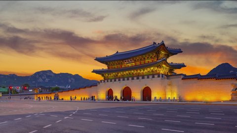 beautiful colorful twilight. of  front gyeongbokgung palace.footage people.standing still.at seoul south korea