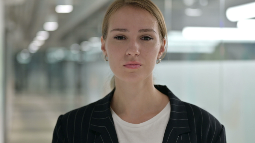 Portrait of Appreciative Businesswoman showing No Sign by Hand 