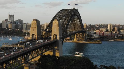 Aerial shot of Sydney Harbor bridge and panoramic view over bay. Australia