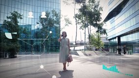 Young model business woman is on the phone in the courtyard of an office complex surrounded by a digitally faded in network and data. Financial data, motion graphics - Powered by Shutterstock - Get 15% off with code: PIKWIZARD15