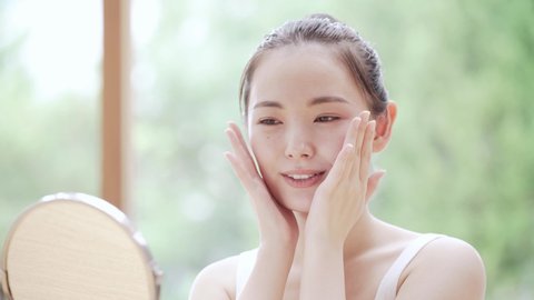 Young woman doing skin care