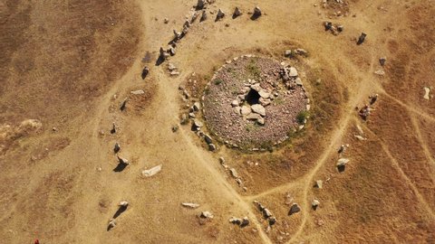 Ancient Observatory Karahunj Zorats Karer in Armenia,aerial view.   Zorats Karer is a prehistoric monument in Armenia.There are 223 standing stones - menhirs, most of them with the hole.