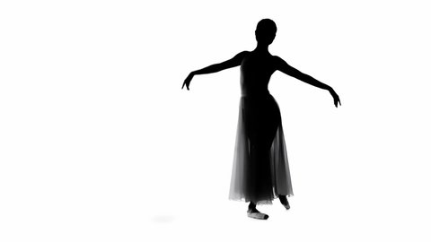 Silhouette of ballerina performing classical ballet moves isolated on white