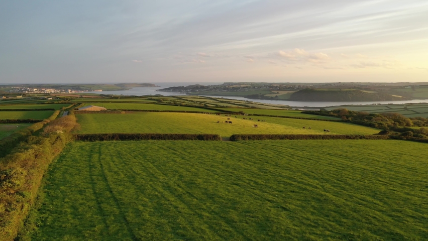 Aerial clip of rolling farmland Cornwall, England, United Kingdom, Europe | Shutterstock HD Video #1058824822